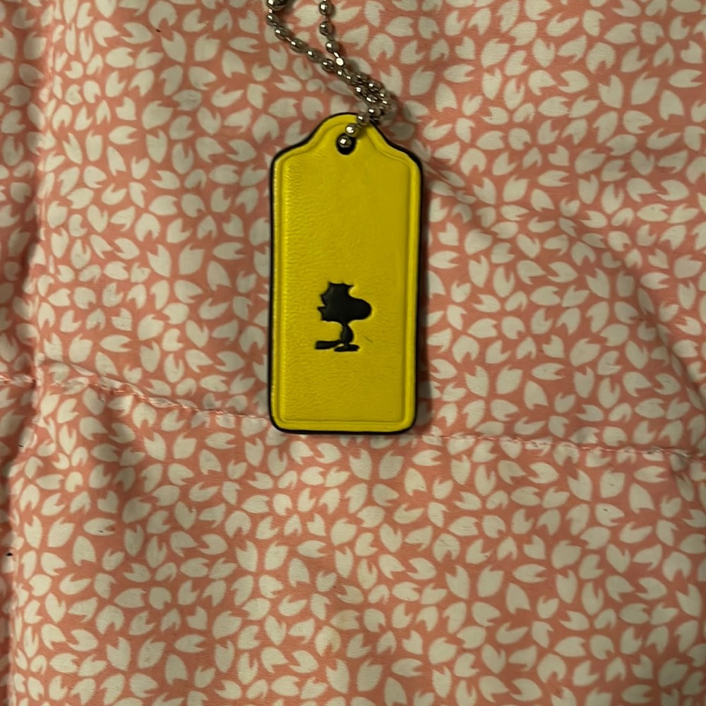 Coach Woodstock bag charm.